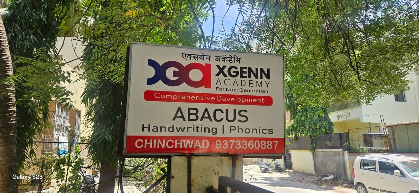 XGenn Academy Chinchwad branch roadside signboard